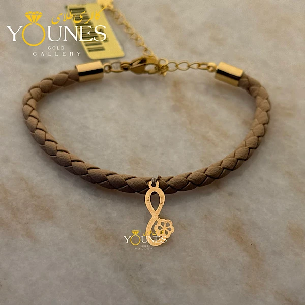 دستبند چرم گل بینهایت طلا